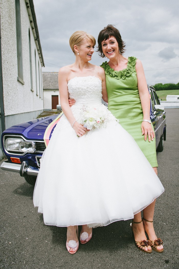 bride and wedding guest 50s style wedding